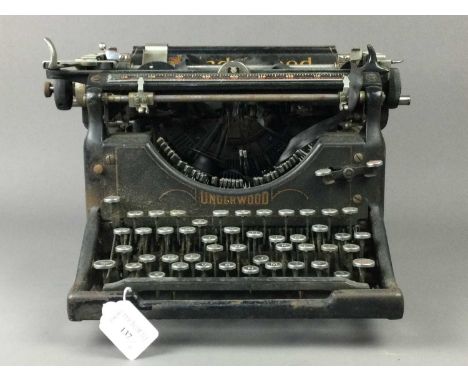 UNDERWOOD TYPEWRITER,along with a pair of hammered pewter vases and a trench art vase (4)