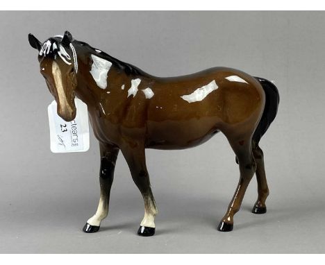 BESWICK CERAMIC MODEL OF A HORSE,22cm long, along with various other ceramic and composite animal figures (14).