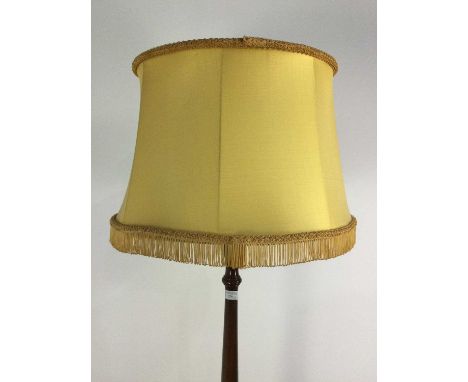 20TH CENTURY STANDARD LAMP, with yellow fringed shade, 183cm high overall, along with a nest of tables and a coffee table (3)