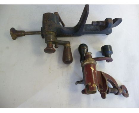 Two similar late 19th/early 20thC shotgun cartridge making tools with bench clamp attachments