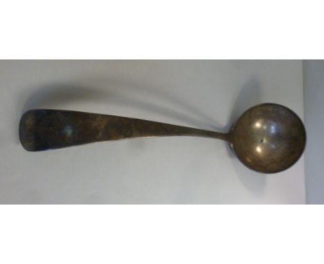 A late Victorian silver Old English pattern soup ladle, having a circular bowl and an engraved armorial device on the termina