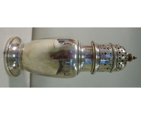 A silver caster of baluster vase design, the domed cover with uniformly pierced ornament and a turned finial  Adie Bros  Birm