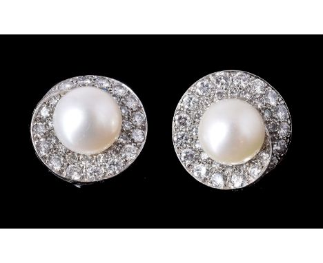 A pair of cultured pearl and diamond ear clips by Petocchi, the central 10mm cultured pearl within a swirled surround set wit