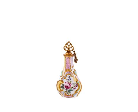 A south Staffordshire flattened baluster enamel scent bottle, circa 1760, painted with flower sprays, gilt C-scrolls and rain