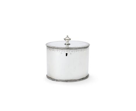 A George III silver straight-sided oval tea caddy probably by Samuel Wood, London 1779, with an urn finial to the hinged flus