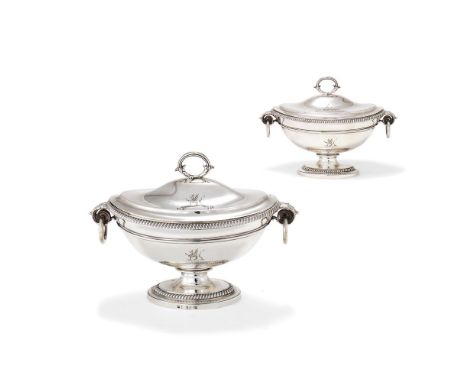 A pair of George III silver oval pedestal sauce tureens and covers by Paul Storr, London 1799, with reeded loop handles issui