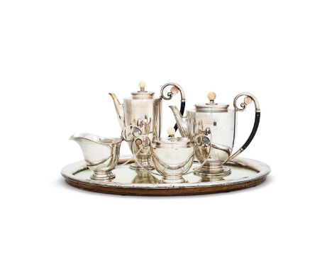 ϒAn Italian Art Deco four piece tea and coffee service by Ricci & C., Alessandria, 1934-1944, .800 standard, with ivory ball 