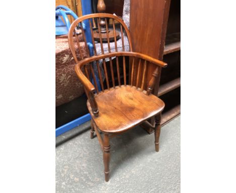 An ash and elm low backed windsor chair, on ring turned legs and H stretcher, 52cmW 