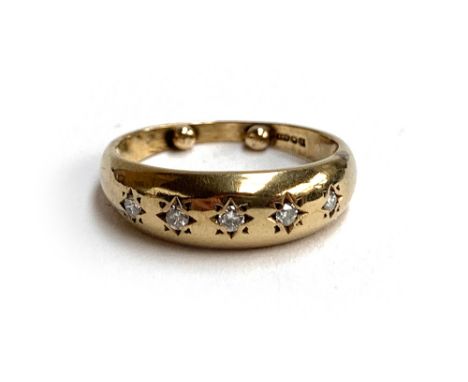 A 9ct gold gypsy ring set with five diamonds, resizing dots, size M, 2.3g 