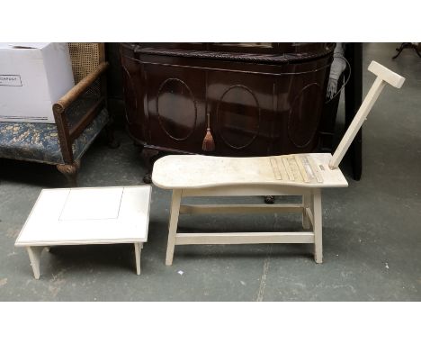 A white painted artist's bench, with raked canvas support, together with a small white painted bed table (2)