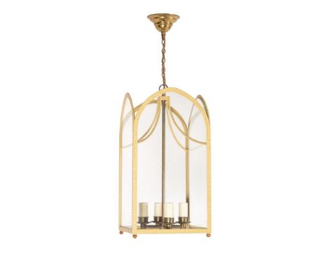 A yellow painted metal hall lantern in Regency style, of recent manufacture, with four arched glazed panels, 49cm high 