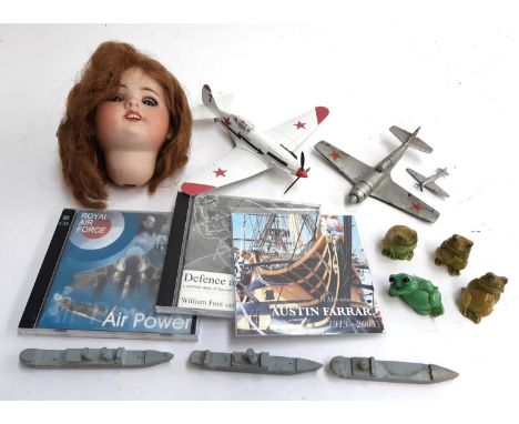 A mixed lot to include an S.F.B.J 60 Paris dolls head, an air signature 1:48 scale mig-3, Dinky Hawker hurricane, frog pencil