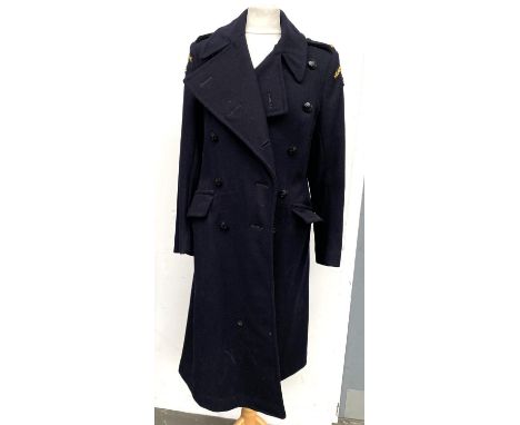 A women's navy double breasted greatcoat for the Civil Defence Corps, size 10, together with a Kangol beret 