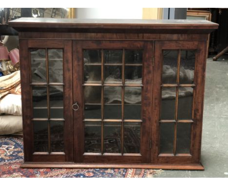 A Victorian mahogany glazed cabinet, three sections with adjustable shelves, with glazed double hinged door, 110x31x83cmH 