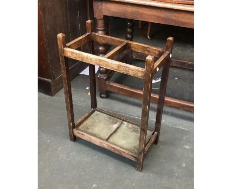 An oak stick stand with drip tray, 46x25x66cmH 