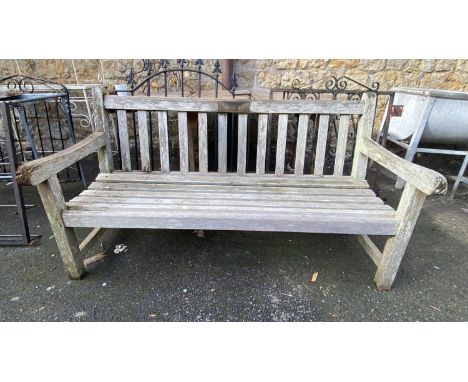 A solid oak garden bench, 152cmW 