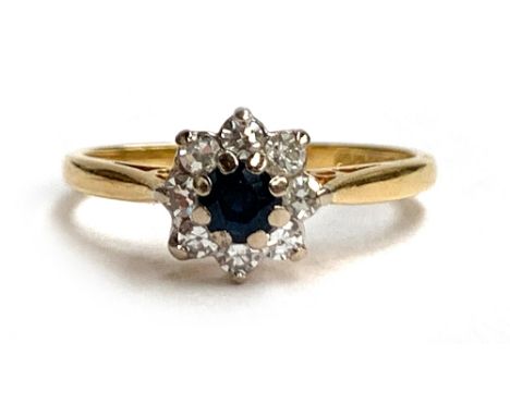 An 18ct gold sapphire and diamond floral cluster ring, size M, 2.5g 