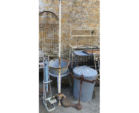 A cast metal table lamp base with paw feet, 180cmH, together with cast iron scales and a vintage garden foot pump 