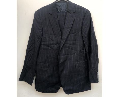 An Austin Reed two piece single breasted pin stripe suit, size 44R, together with a further Austin Reed 44R two piece navy su