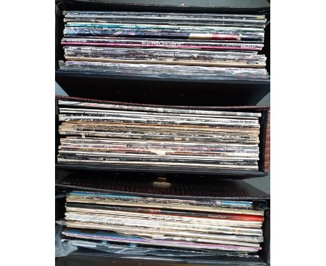 A quantity of vinyl LP's to include Rod Stewart, Bob Dylan, Status Quo, Bon Jovi, Genesis, Black Sabbath, Eurythmics, in thre