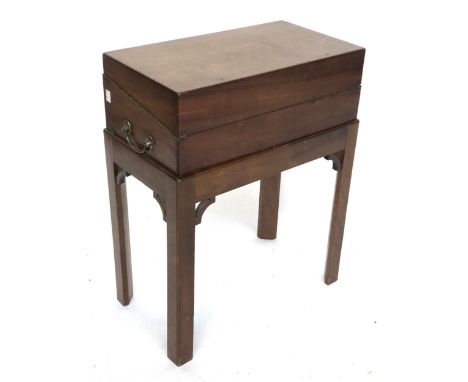 A 19th century mahogany writing box, opening to a tooled green leather slope, various fitted compartments, on a stand, 47x27x
