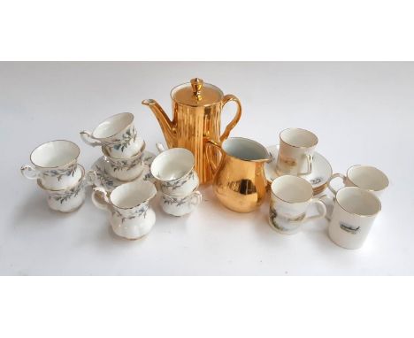A Royal Albert 'Brigadoon' part coffee set comprising 6 cups and saucers, and a cream jug, together with a Royal Worcester Fi