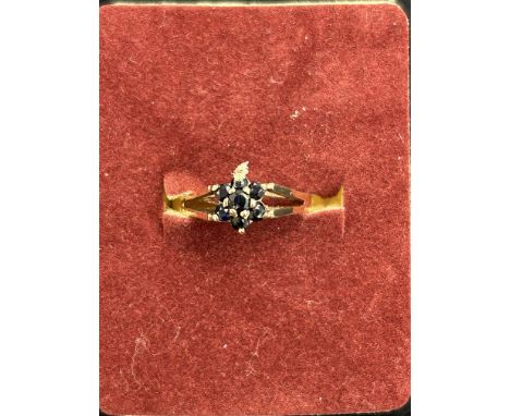 9ct Gold ring set with sapphire cluster Size M.5 