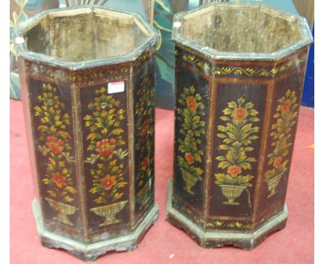 A pair of floral polychrome painted octagonal stick stands