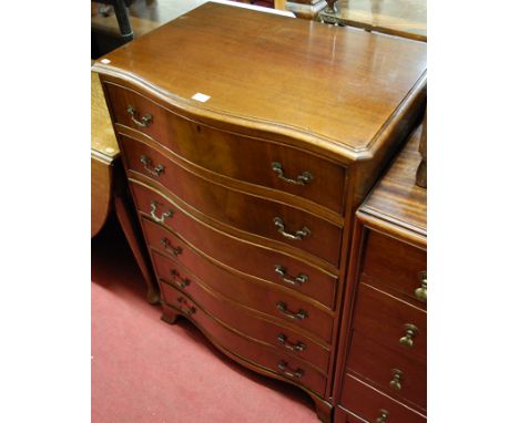 A mahogany serpentine front chest of six long drawers on splayed bracket supports, width 70cm