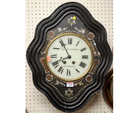 A late 19th century French ebonised vineyard clock, the white enamel dial signed Castelnaudari a Chambery, having spring driv