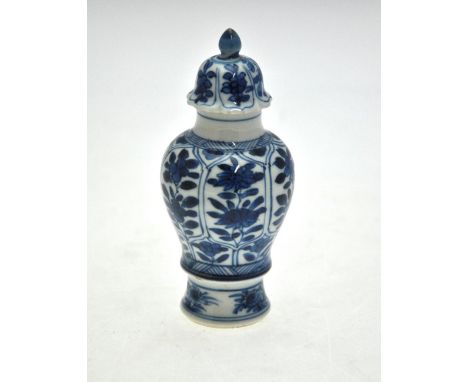 A Chinese blue and white small vase decorated with six panels of flowers and foliage to/w an associated cover decorated with 