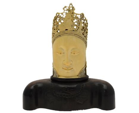 A Chinese ivory tusk carving of the head of Guanyin, 4 character mark to base, late 19th/early 20th century approx. 28 cm hig