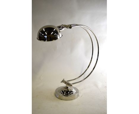 An Art Deco style nickel-plated desk-lamp with domed shade and adjustable twin-rail curved pillar