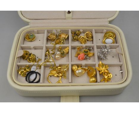 A jewel box containing various items of vintage and later jewellery including Monet rings, brooches, earrings, bangle, watch 