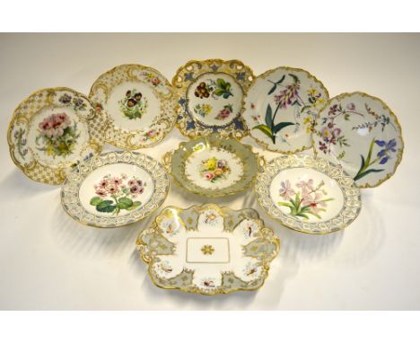 A collection of nine Victorian Staffordshire pieces comprising two low tazzas with pierced borders and central painted floral