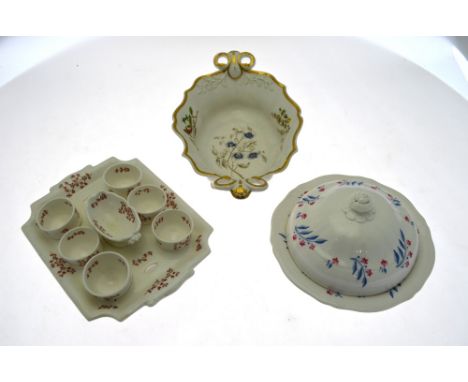 A Ridgway rectangular egg cup stand c/w six egg cups circa 1820s to/w a Ridgway muffin dish decorated with pink flowers and b