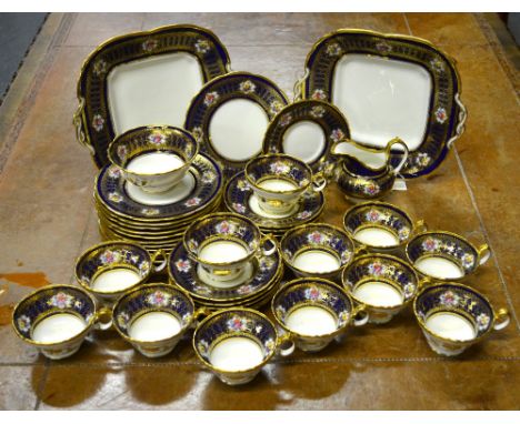 A Cauldron tea service, deep cobalt blue band, finely gilded with floral reserves, early 20th century, pattern 2281 comprisin