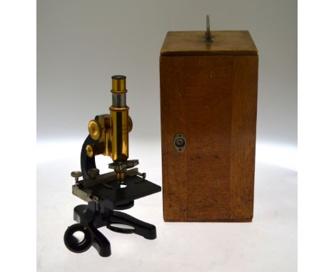 An Ernst Zeiss, Wetzlar brass and lacquered microscope no.275797, with lenses and accessories, in teak box (little used)