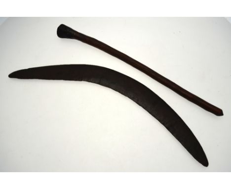 An old Australian Aboriginal boomerang, 63 cm, a (probably) Pacific tribal carved wood club with linear scratched decoration 