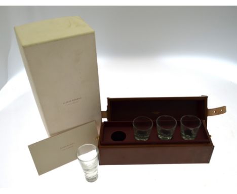 A modern Alfred Dunhill 'Tradition Touring' set of four crystal shot-glasses in fitted leather case with red goatskin lining,