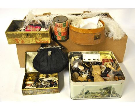 A large collection of vintage buttons contained in a biscuit tin to/w two smaller decorative tins containing mostly mother-of