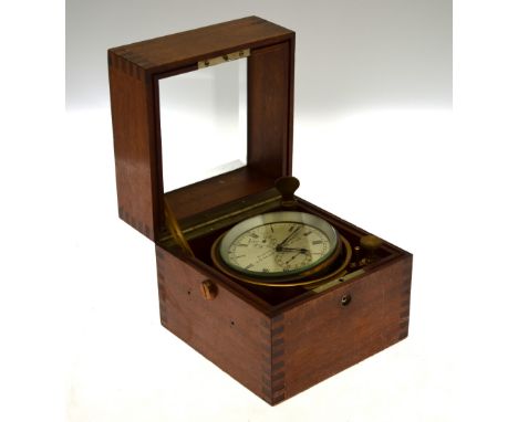 Riggs & Brother, London No 5732, a mahogany cased lacquered brass chronometer having an engraved silvered dial within a gimbl