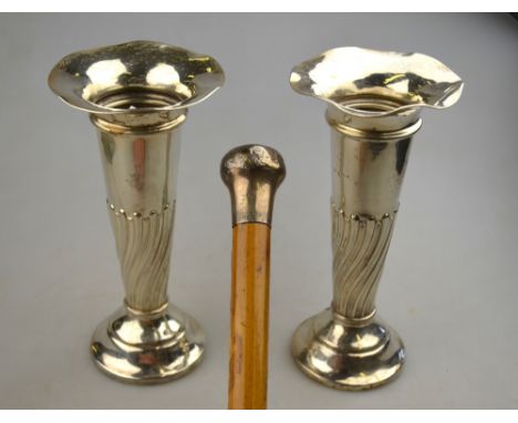 A pair of silver tapering vase-flutes with flared rims and reeded and fluted stems, on weighted and domed bases, William Hutt