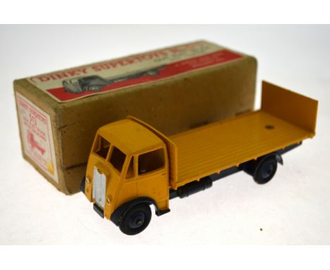 A boxed Dinky Supertoys 513 Guy Flat Truck with Tailboard Condition Report Light surface blemishing, box good