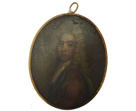 A Georgian oval portrait miniature of a fine bewigged gentleman within a pinchbeck framed, 8 cm x 6.5 cm Condition Report muc
