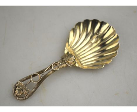 A Victorian silver caddy spoon with shell bowl and open-work vine handle, George Unite, Birmingham 1857 Condition Report Sign