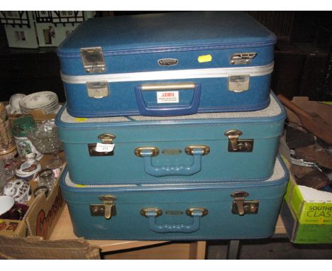 3 vintage suit cases, 2 foxcroft and 1 vanguard