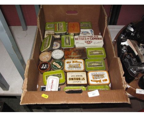 Box of vintage tobacco tins