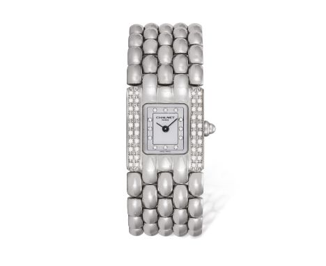 A LADY'S STAINLESS STEEL, MOTHER-OF-PEARL AND DIAMOND-SET BRACELET WATCH, BY CHAUMET  Of Quartz ETA Cal. 976001, movement, th