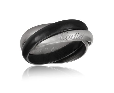 A TRINITY RING, BY CARTIER, CIRCA 2015  Designed as three interlocking bands, two polished white gold hoops and one in black 